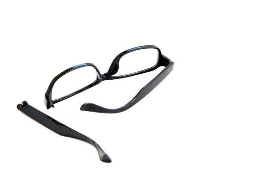 Broken Eye Glasses, Isolated On White Background. Black Celluloid Frame.