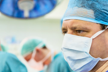 Male  experienced surgeon in operation room - 257160316
