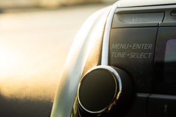 Car audio menu button with warm light
