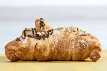 Stuffed brioche on a wooden table