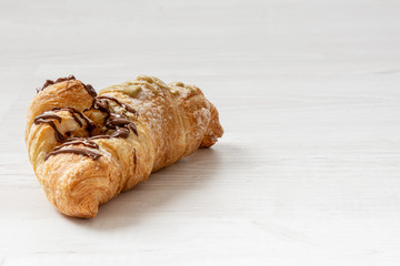 Stuffed brioche on a wooden table