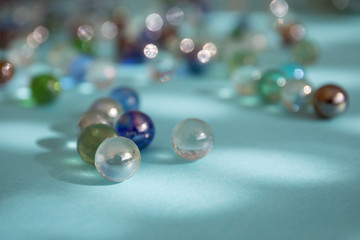 Colored beads on blue background