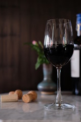 Red wine by the glass on the bottle