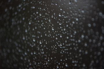 Water droplets on rainy winter windows