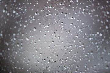 Water droplets on rainy winter windows