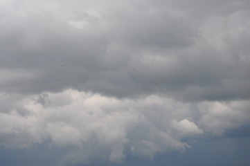 Obraz premium Blue sky with gray clouds. Thunder Sky.