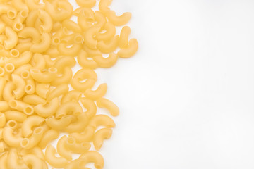 raw russian pasta makaroni on the white background