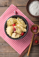 Ukrainian Pierogi - sweet dumplings with cherry and cottage cheese filling