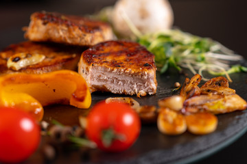 Cooked medallions of pork fillet sliced through