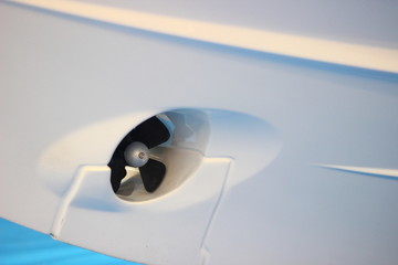Auxiliary bow thruster on the stern of a motor boat - ship mooring