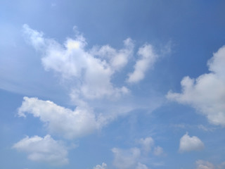 Blue sky background with clouds