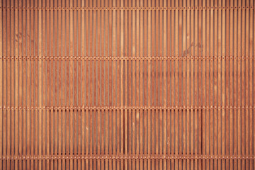 Old vintage wooden background with bamboo