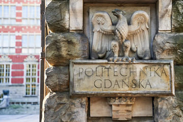 Entrance of Gdansk University of Technology in Poland with words Politechnika Gdanska meaning this higher educational institutiton's name in Polish with the eagle emblem