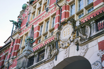 The main building of Gdansk University of Technology or Politechnika Gdanska with emblem above entrance in Poland