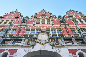 The main building of Gdansk University of Technology or Politechnika Gdanska with emblem above entrance in Poland
