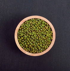 green bean on black background