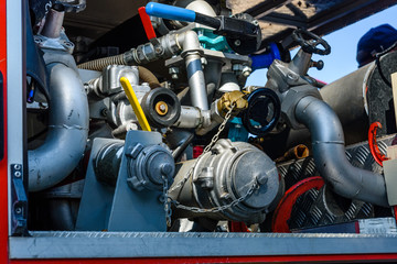 Closeup of the modern fire truck with firefighting equipment