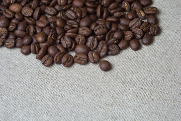 coffee beans on burlap background