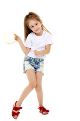 Fototapeta premium Little girl in sunglasses.