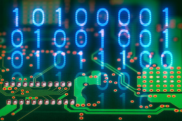 Binary code. Printed circuit board back side. Digital electronic background. Hardware component. Abstract green texture of PCB detail. Blue 0 and 1 digits. Electrotechnics, industry, tech engineering.