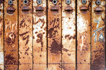 Rusty old metal mailboxes
