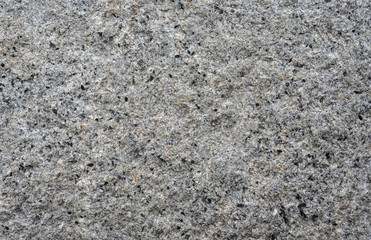 Natural stone grey granite background.