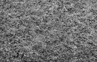 Granite background close up. Bright hard grey granite rock texture for template or mock up.