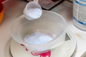 Hairdressing set measuring bowl on scales