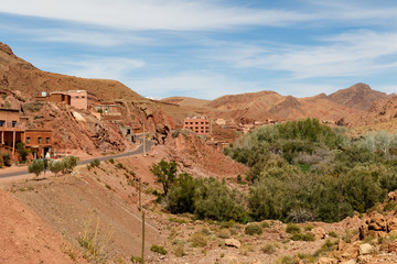 Fortified city along the former caravan route between the Sahara and Marrakech in Morocco with snow covered Atlas mountain range in background