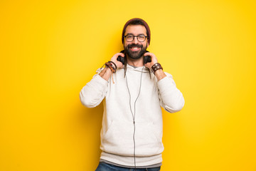 Hippie man with dreadlocks with headphones