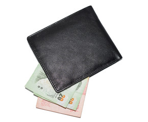 Isolated men's purse from black skin with money