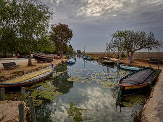 Obraz premium Boats in the port of Silla, at the entrance of the lagoon of Valencia, Spain