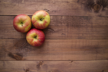 Apples on a wooden background. Proper diet. Healthy diet. Vegetarianism. Proper Breakfast. The right snack.