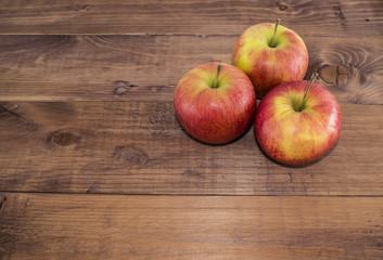 Apples on a wooden background. Proper diet. Healthy diet. Vegetarianism. Proper Breakfast. The right snack.