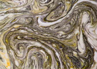 Beautiful abstract painting is a painting technique Ebru .Turkish Ebru style on the water with acrylic paints wring wave.Stylish combination of luxury.Contemporary art marble liquid texture