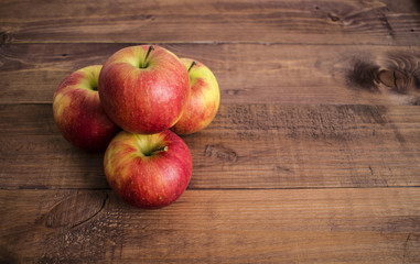 Apples on a wooden background. Proper diet. Healthy diet. Vegetarianism. Proper Breakfast. The right snack.