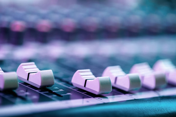 Close up of fader's on sound mixing console. Details of sound engineer room.