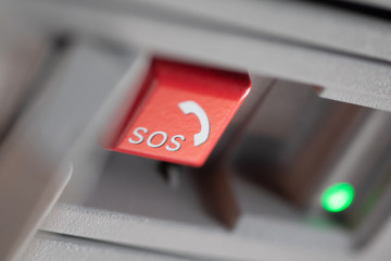 Emergency sos button close up which is used for help after car accident