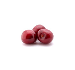 Photo of red cherries isolated on white background