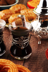 Middle eastern or arabic dishes and assorted meze, concrete rustic background. Turkish Bread or Turkish pizza. Dessert Baklava with pistachio. falafel with hommos.  Halal food. Lebanese cuisine