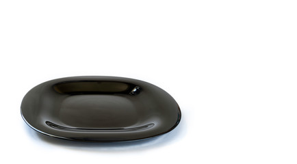 flat black dish on white background