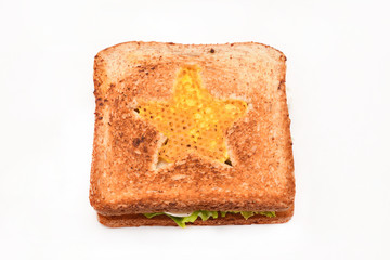 Beautiful grilled sandwich with a star on a white background. Isolated