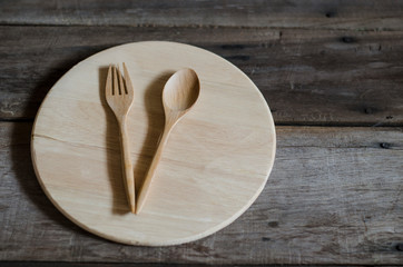 wood spoon and fork on old background kitchen