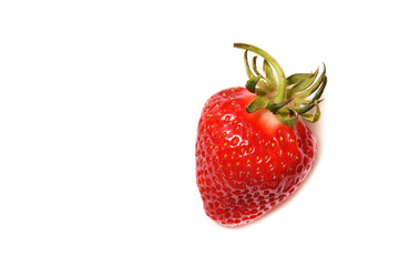 Beautiful and fresh strawberries from home garden on a white background. Close-up