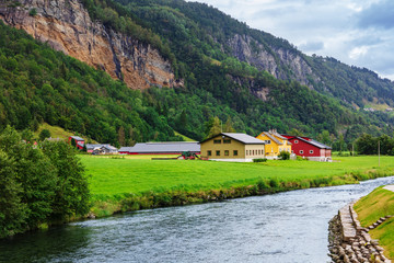 Fototapeta premium houses by the river, Norway