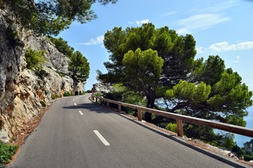 Open coastal road winding through to lighthouse Cap Formentor