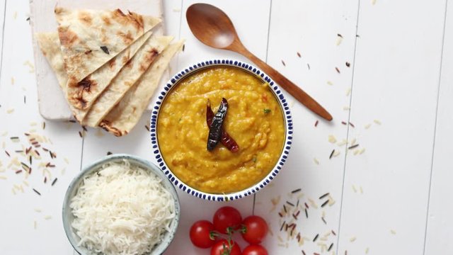 Indian popular food Dal fry or traditional Dal Tadka Curry served in bowl