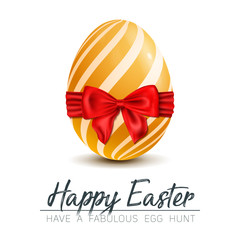 luxury golden Egg with red bow for Easter