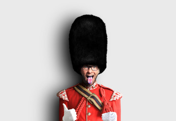 Young man in the costume of the Royal guards of Britain