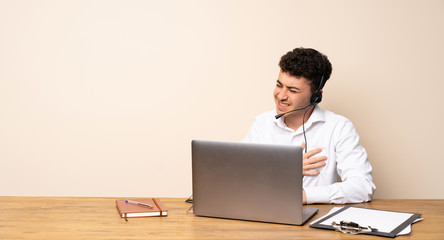 Telemarketer man having a pain in the heart